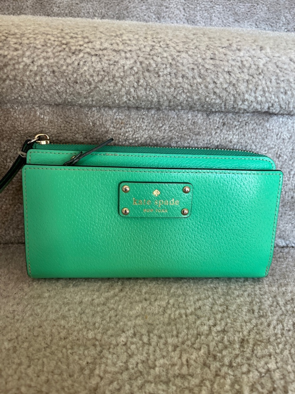 kate spade bright green leather wristlet wallet with gold logo plate